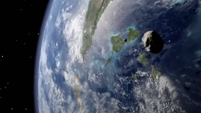 Ein Asteroid fliegt auf die Erde zu.  Quelle: Screenshot YouTube